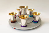 kiddush cup set with colored base by itzhak luvaton