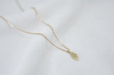 TINY HAMSA NECKLACE