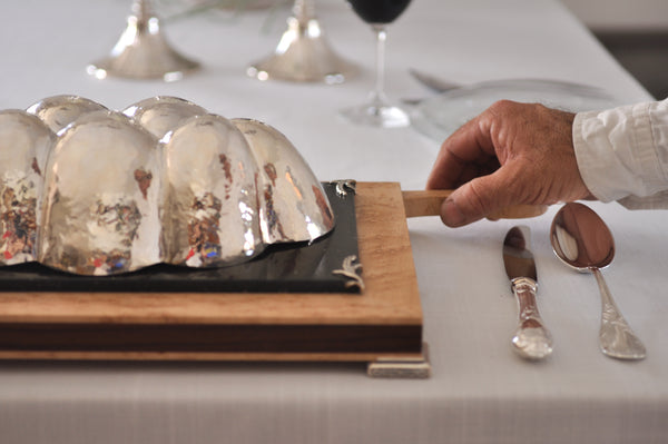 Shabbat table setting with Itzhak Luvaton's challa board