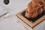 Shabbat table setting with Itzhak Luvaton's challa board