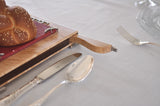 Shabbat table setting with Itzhak Luvaton's challa board and knife